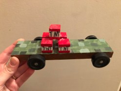 A Minecraft TNT car designed and made by Caleb H, age 7, Wichita, Kansas. It won Best of Show in his pack in 2018!