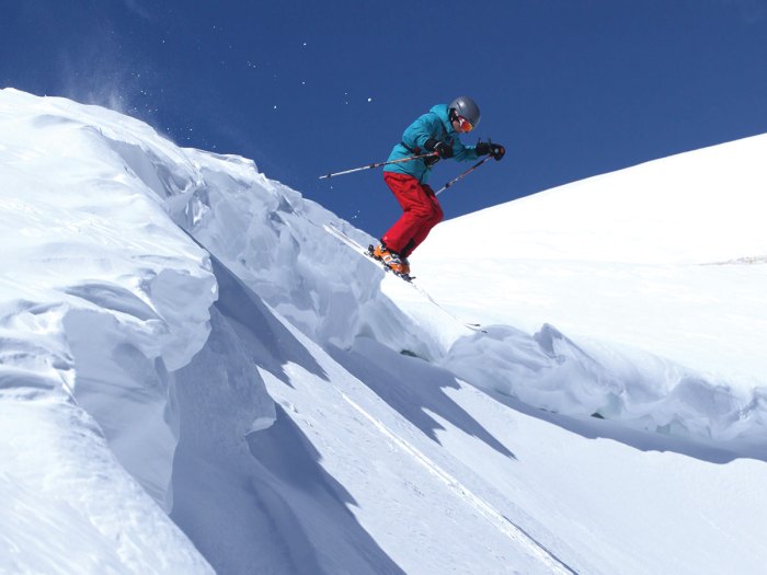 scout jumping on skis