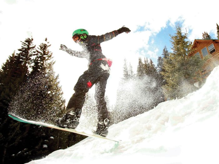 snowboarder having a blast doing snow sports