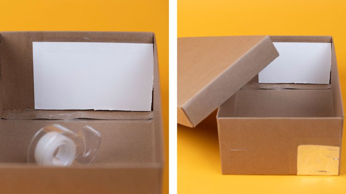 Taping a piece of white paper inside the box to use as a projection screen